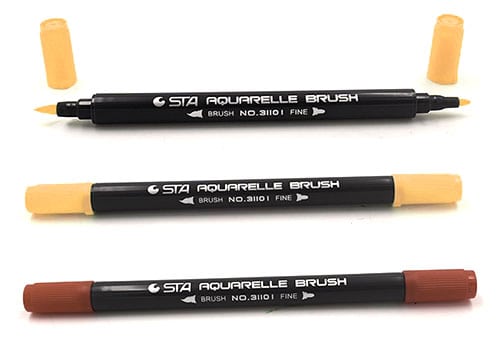 A picture of three artistic markers